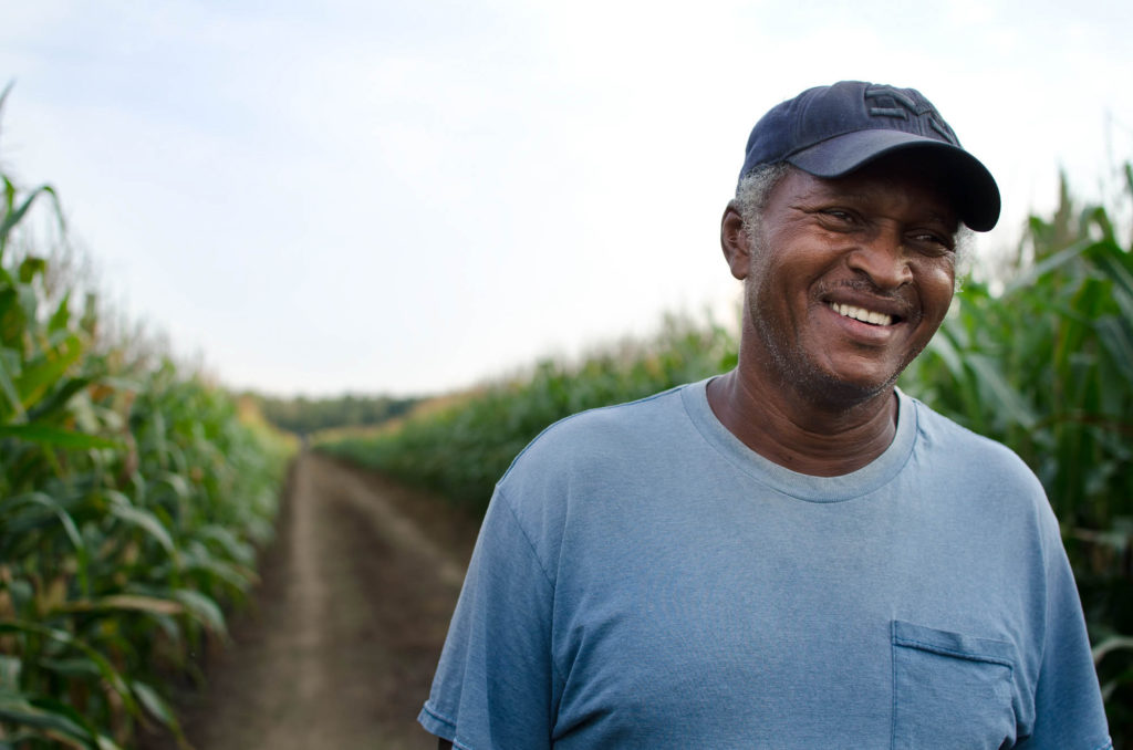 Rodger Outlaw of Shadefund, smiling in his fields