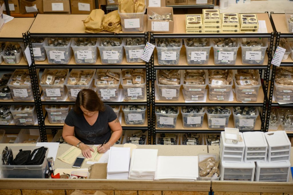 Woman working on inventory files