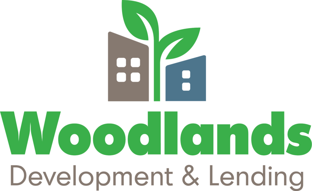 Woodlands Development & Lending Logo